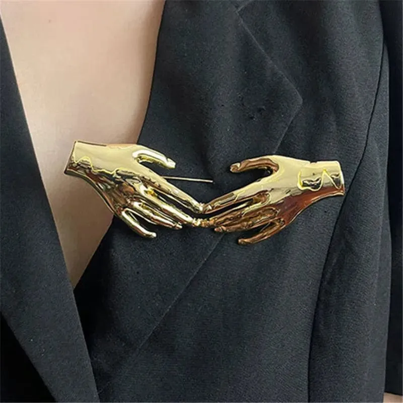 HANDS Sculptural Brooch – Gold & Silver Statement Pin