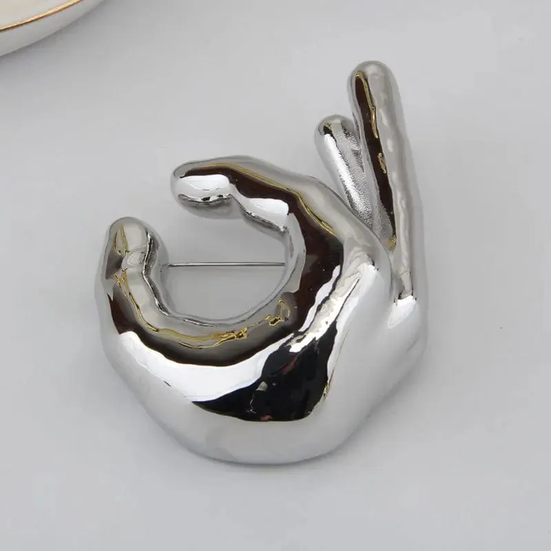 HANDS Sculptural Brooch – Gold & Silver Statement Pin