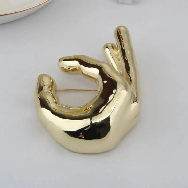 HANDS Sculptural Brooch – Gold & Silver Statement Pin